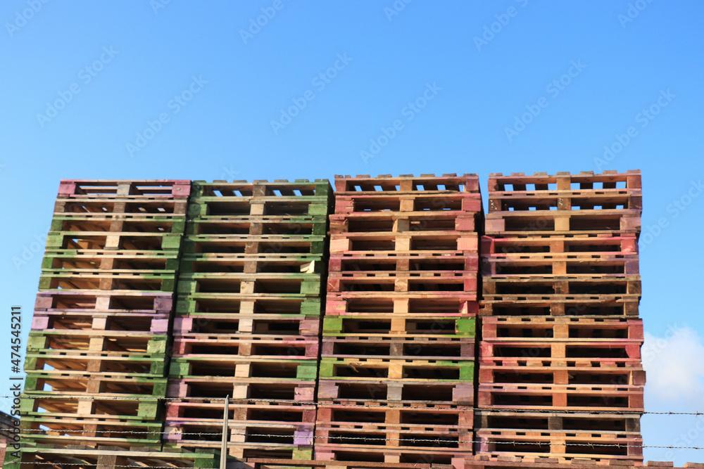 Piles of wooden cargo pallets Piles of wooden cargo pallets