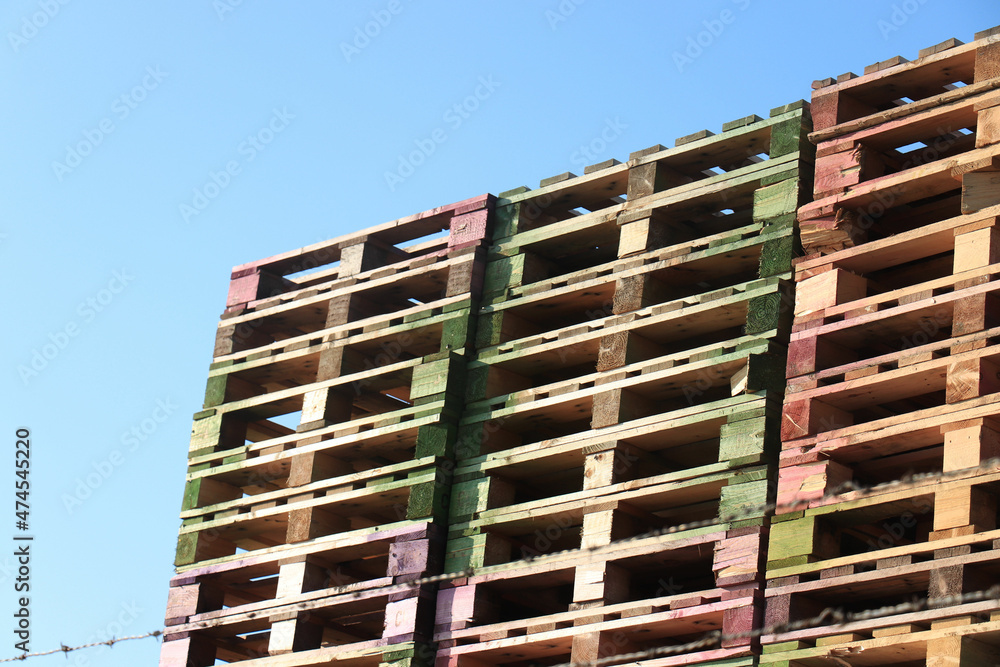 Piles of wooden cargo pallets