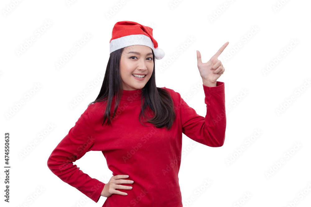 Asian Woman with Santa Hat Pointing Finger to Blank Copy Space For Christmas Sale Content Asian Woman with Santa Hat Pointing Finger to Blank Copy Space For Christmas Sale Content