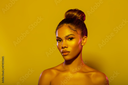 Beauty style Fashionable portrait of American Girl in mustard filter. Beauty girl face close up. Closeup portrait black woman with copy space. Art makeup and beautiful portrait lighting.- image.  