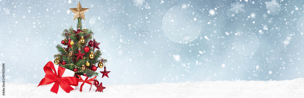 Christmas Tree with decoration on a winter background. Christmas Tree with decoration on a winter background.