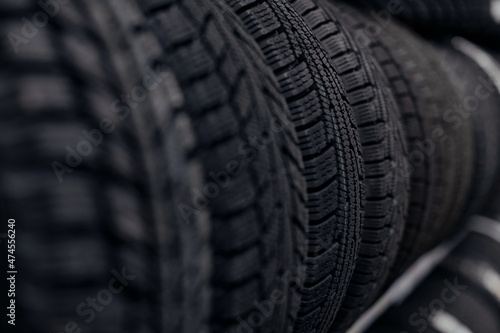 car tires on a rack in a car store