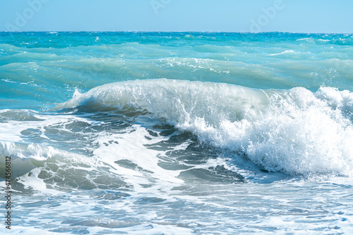close-up sea surf, waves and foam © Evgeny