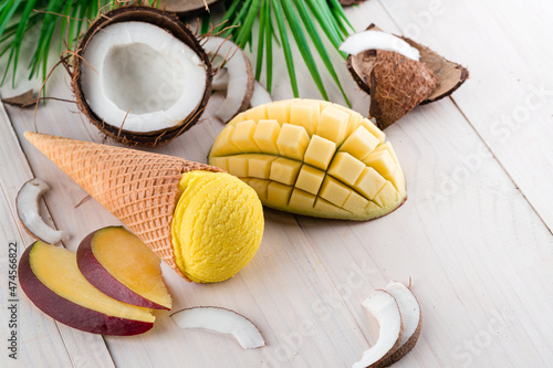 Delicious yellow ice cream in a coconut shell, Mango ice cream
