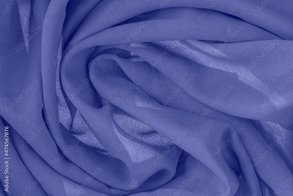 Fabric texture waves in spiral shape, abstract background, trendy color Fabric texture waves in spiral shape, abstract background, trendy color