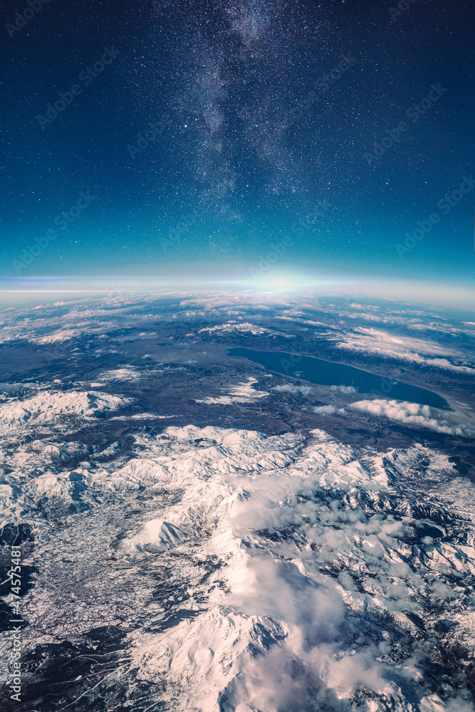 View of stars and milkyway above Earth from space. Beautiful space view of the Earth with cloud formation - obrazy, fototapety, plakaty 