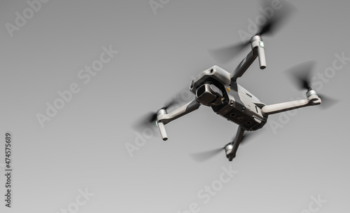 Ukraine, Nikolaev - November 21, 2021 Drone with a quadrocopter with a camera flying in the air. Drone Air 2S