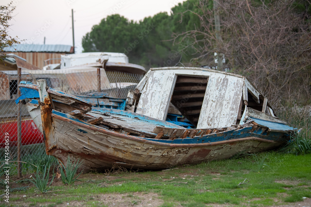 A scrapped wooden old rowboat