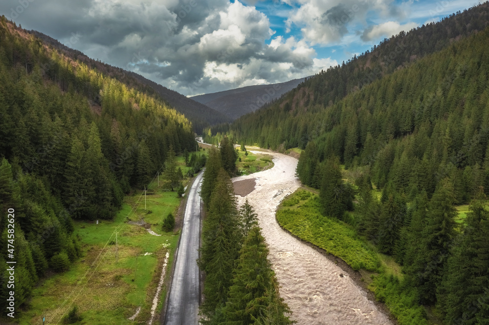 Aerial view of the forest and mountains in the Carpathians, beautiful landscape. Tourism, travel, Ukraine Aerial view of the forest and mountains in the Carpathians, beautiful landscape. Tourism, travel, Ukraine