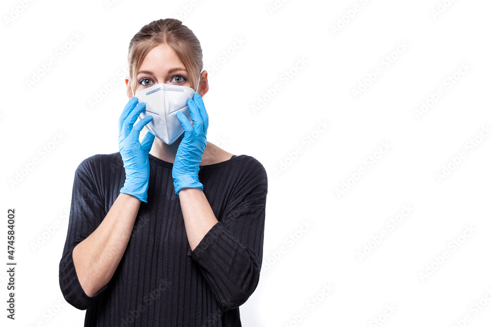 studio photo on white background of a young sick woman wearing mask and latex gloves studio photo on white background of a young sick woman wearing mask and latex gloves