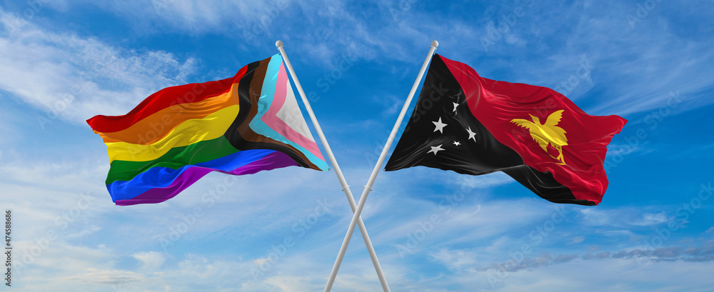 crossed flags of progress lgbt pride and Papua New Guinea flag waving