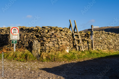 Hill walking the Norber Eratics around Austwick in Craven in  the Yorkshire Dales photo