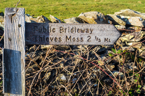 Hill walking the Norber Eratics around Austwick in Craven in  the Yorkshire Dales photo