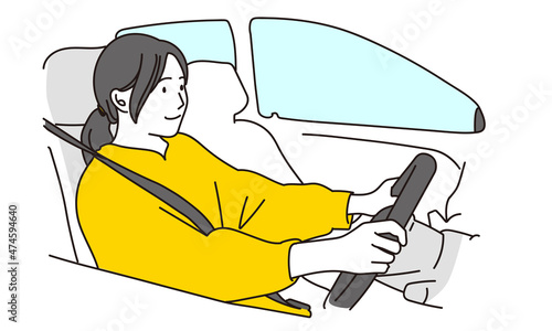 自動車を運転する女性