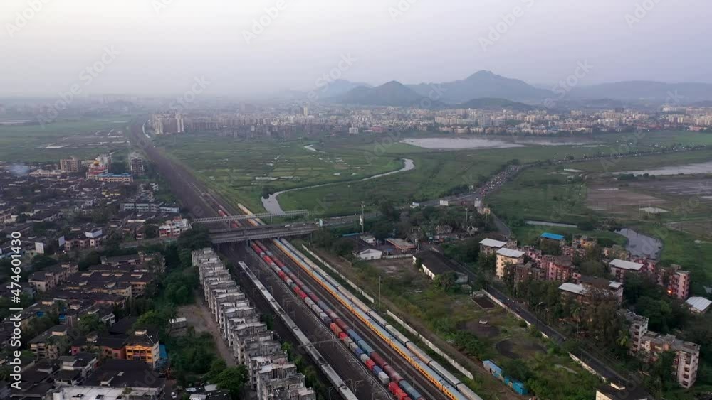 Aerial of Main Railway Station in Vasai, Mumbai, India On a Misty Day - drone shot Aerial of Main Railway Station in Vasai, Mumbai, India On a Misty Day - drone shot