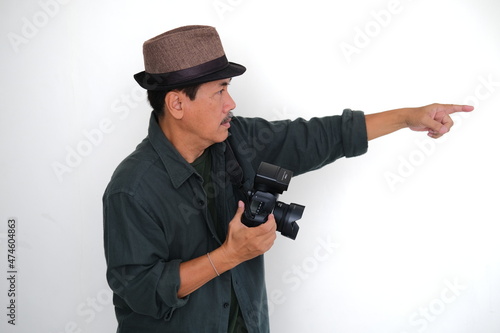 man with camera giving instruction