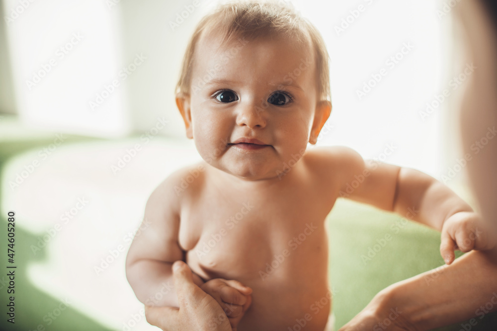 Close up portrait of caucasian little baby laugh while looking at the camera. Close up portrait of caucasian little baby laugh while looking at the camera.
