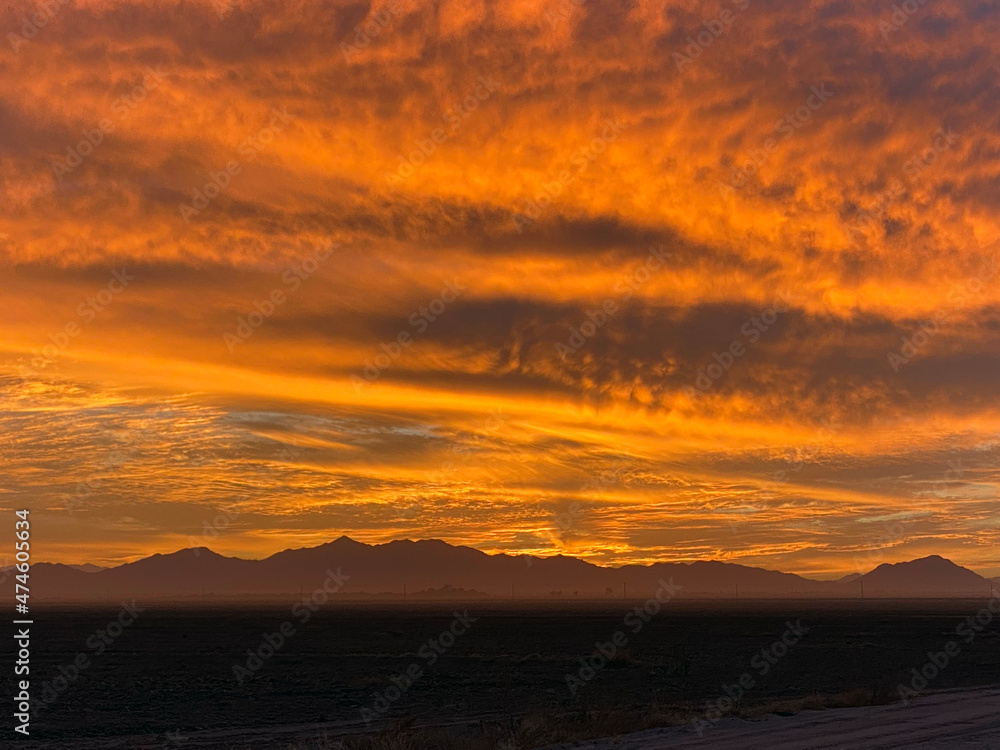 Fiery sunset over Sonoran Desert mountains