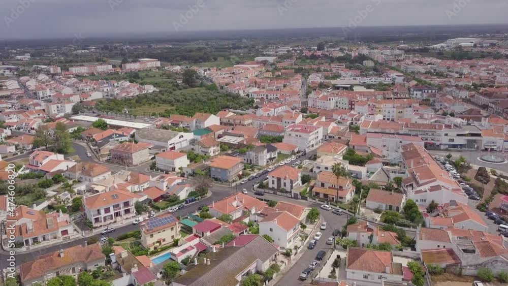 Drone flying over Grandola, a small allentejan town in Portugal. Angled downwards to view the terracotta roofs. Drone flying over Grandola, a small allentejan town in Portugal. Angled downwards to view the terracotta roofs.