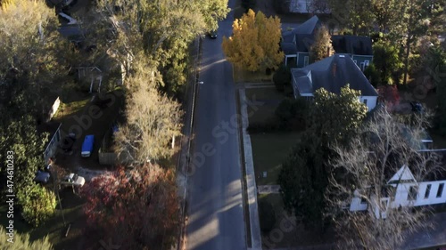 Flying over a quiet neighborhood street in the small town community of Fort Valley, Georgia