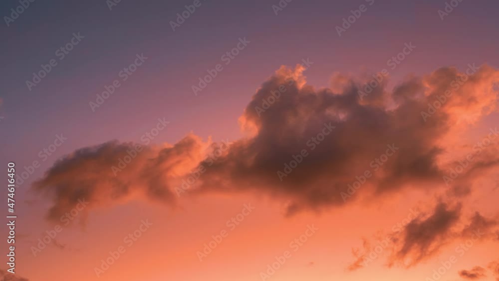 Flying colorful clouds in the blue sky at sunset. 4K time-lapse Flying colorful clouds in the blue sky at sunset. 4K time-lapse