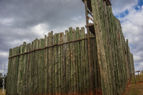 Palisades with guard towers reconstructing the fence line that once enclosed the infamous Andersonville Civil War POW camp in Georgia