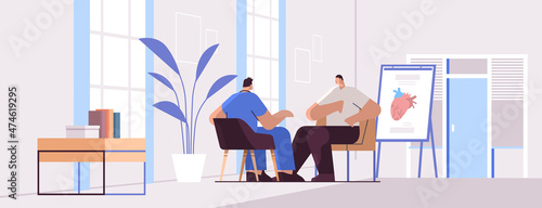 doctor cardiologist in uniform examining male patient medical consultation cardiology healthcare concept