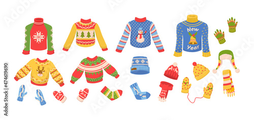 Cute winter warm knitted clothes, Christmas sweaters with festive winter New Year ornaments © Idey