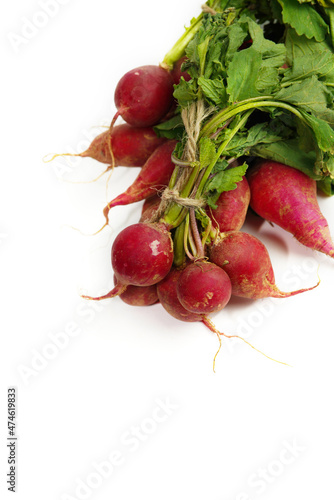 red radish on white background,raw material for cooking. Close up.