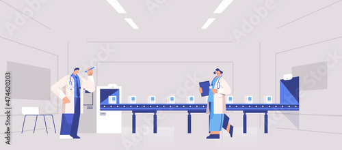 operators team controlling medicine production filling on conveyor belt doctors checking quality of products