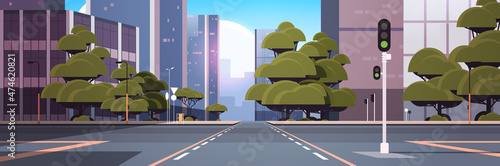 road empty street with crossroad and traffic light city buildings skyline modern architecture cityscape