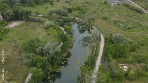 Aerial drone green landscape view of a small river at Mediterranean location photo