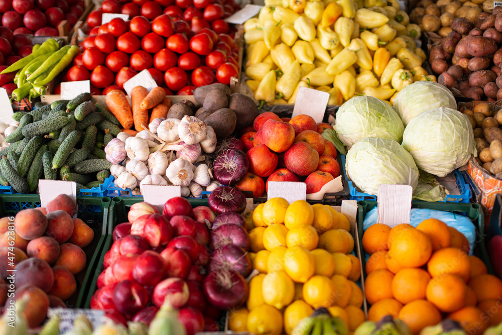 Farmers' market with vegetables and fruits.
