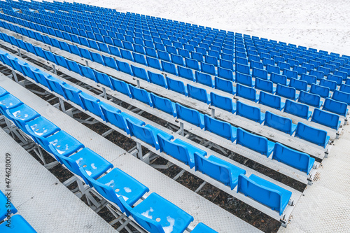 Empty seats in the stadium. Empty stadium in winter.