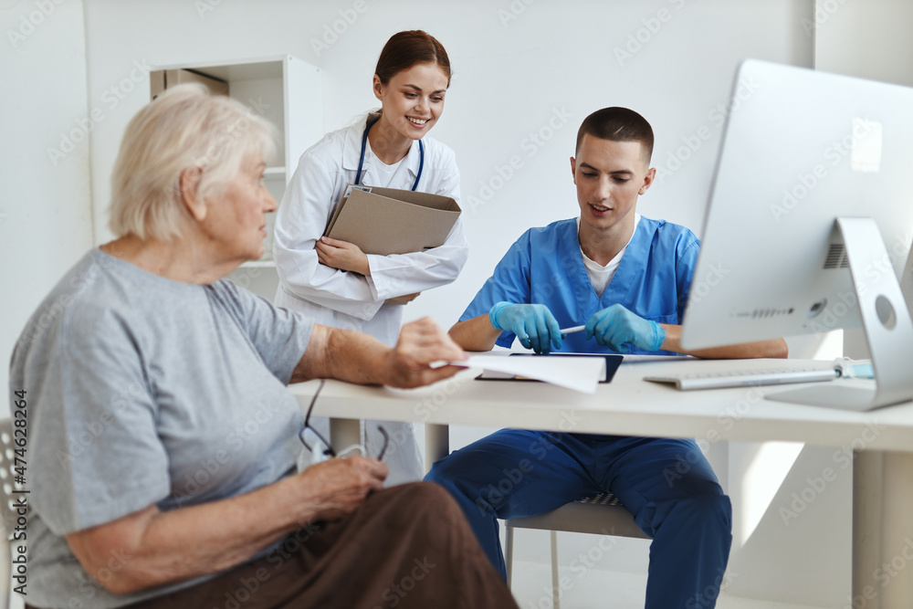 custom made wallpaper toronto digitalan elderly woman communicates with a doctor and a nurse in a health hospital