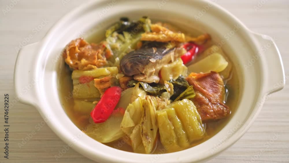 boiled pickled cabbage and bitter gourd soup - Asian and vegan and vegetarian food style boiled pickled cabbage and bitter gourd soup - Asian and vegan and vegetarian food style
