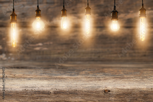 Wooden backdrop with electric lights hanging over a wooden surface