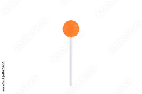Orange mini lollipop isolated on white background.