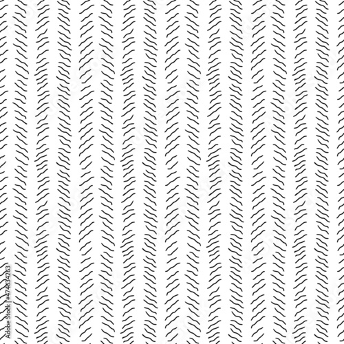 Seamless pattern. Black dashes on a white background, vertical structure.