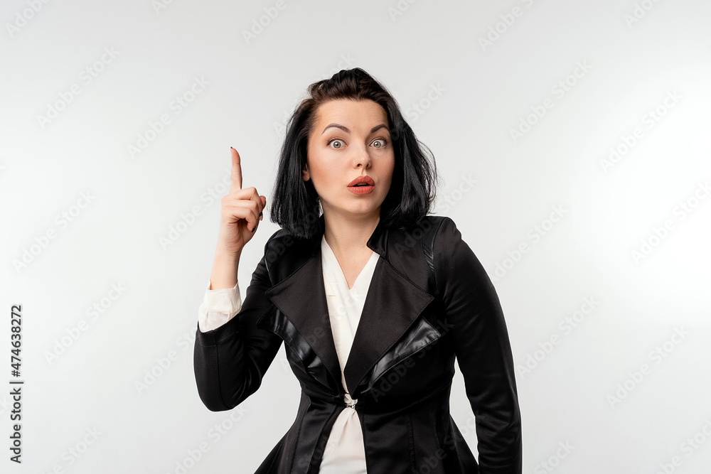 Businesswoman got idea. Career girl keeps finger up. Eureka gesture. Genius at work. Small business owners, women entrepreneurs concept Businesswoman got idea. Career girl keeps finger up. Eureka gesture. Genius at work. Small business owners, women entrepreneurs concept