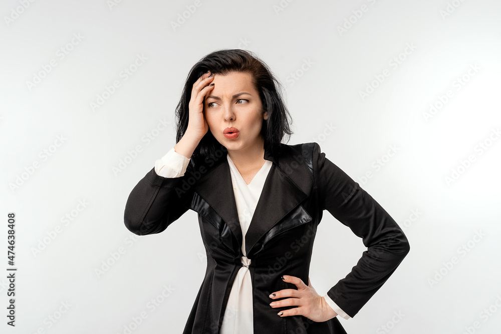 Puzzled businesswoman in black formal jacket white shirt looking dejected, standing over white background. Small business owners, women entrepreneurs concept Puzzled businesswoman in black formal jacket white shirt looking dejected, standing over white background. Small business owners, women entrepreneurs concept