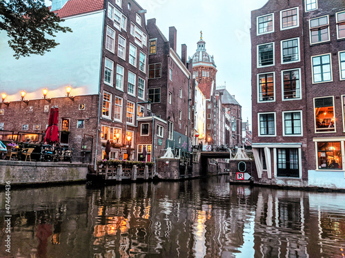 Amsterdam cute city with channels, bridges, old buildings, European architecture, Holland  