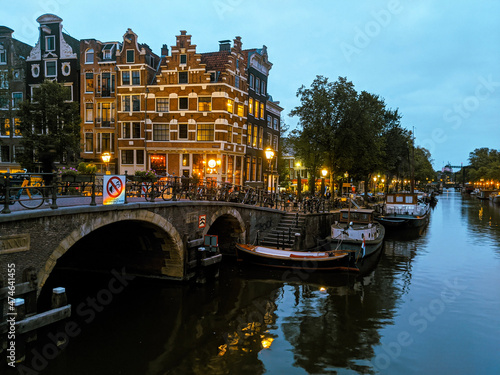 Amsterdam cute city with channels, bridges, old buildings, European architecture, Holland 