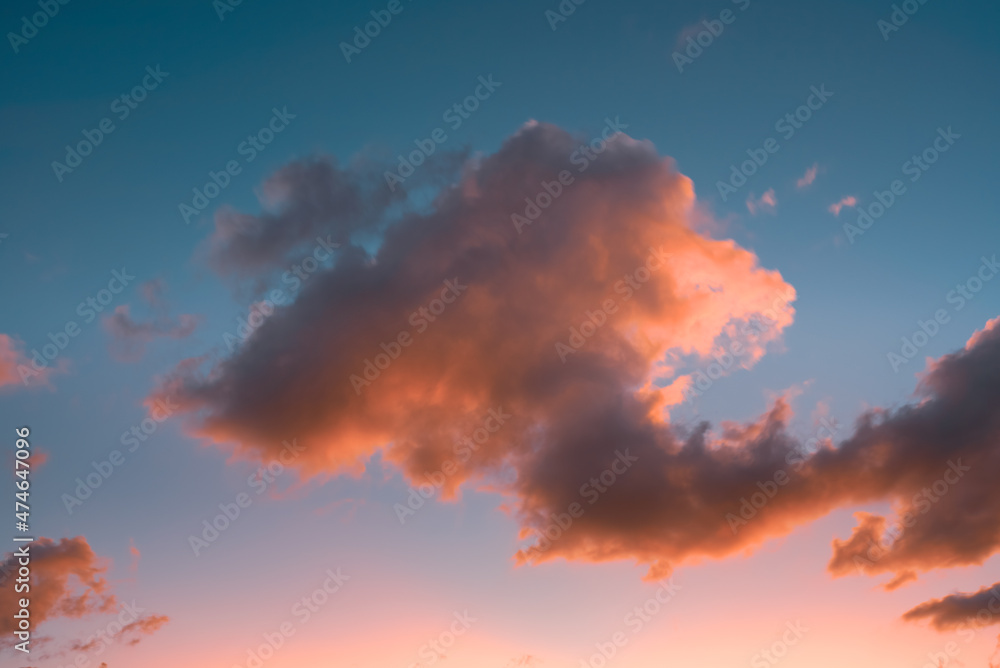Colorful clouds in the blue sky at sunset Colorful clouds in the blue sky at sunset