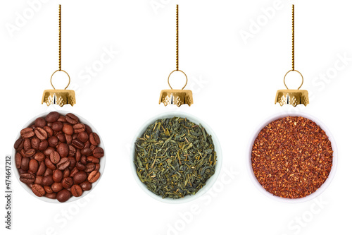 Christmas baubles made from coffee beans, dry green tea and rooibos tea isolated on white background.