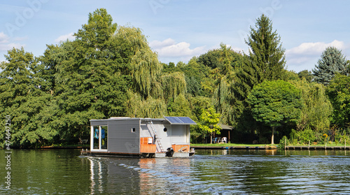Tableau sur toile with the houseboat on the river Dahme in Brandenburg