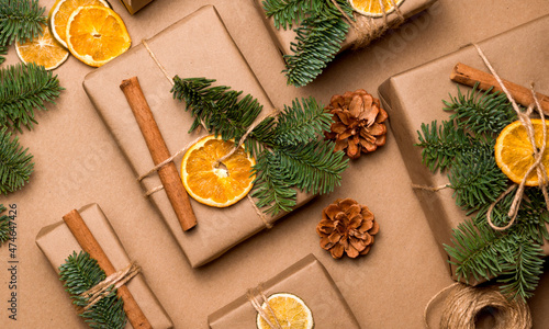 Sustainable Christmas and new year natural flatlay. Gifts, craft paper, cinnamon,spruce