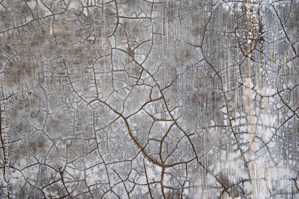 Cracked plaster wall texture, damaged walls exposed to sunlight and rain Cracked plaster wall texture, damaged walls exposed to sunlight and rain