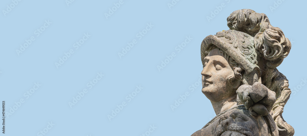 Old statue of a sensual woman warrior, Amazonian, as defender with flag at the Neumarkt in historical and shopping downtown of Dresden, Germany, at blue sky background with copy space Old statue of a sensual woman warrior, Amazonian, as defender with flag at the Neumarkt in historical and shopping downtown of Dresden, Germany, at blue sky background with copy space