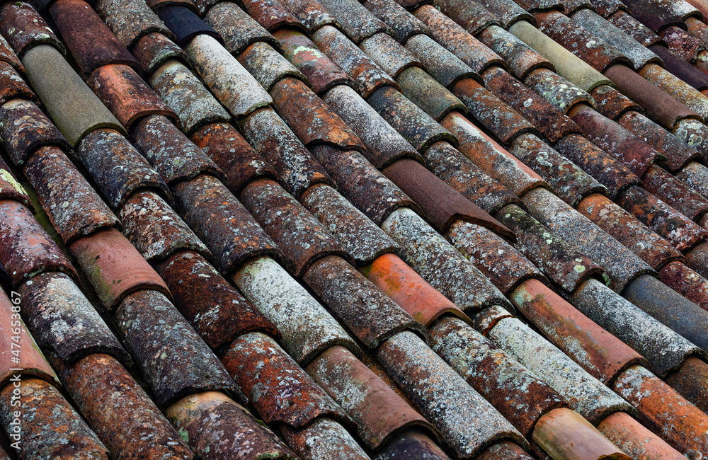 Full frame of weathered tiles of old roof Full frame of weathered tiles of old roof